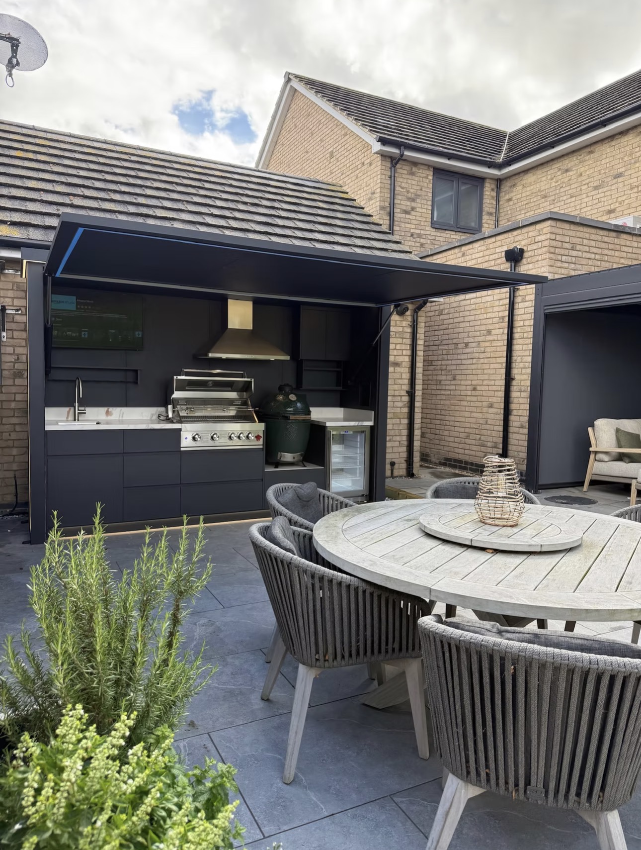 RANGER outdoor kitchen module installed in a patio dining area