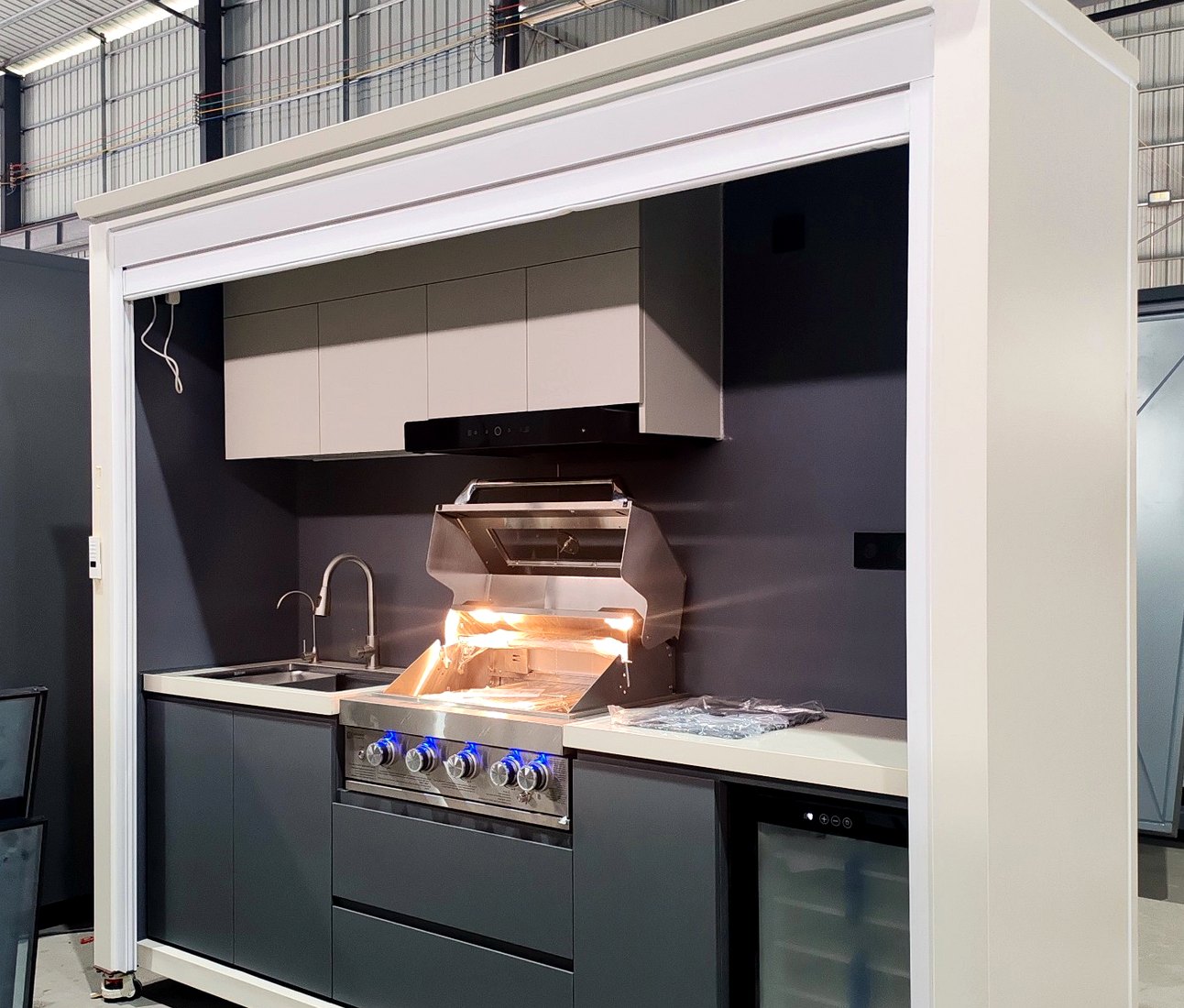 Roll-up outdoor kitchen side structure and shutter detail