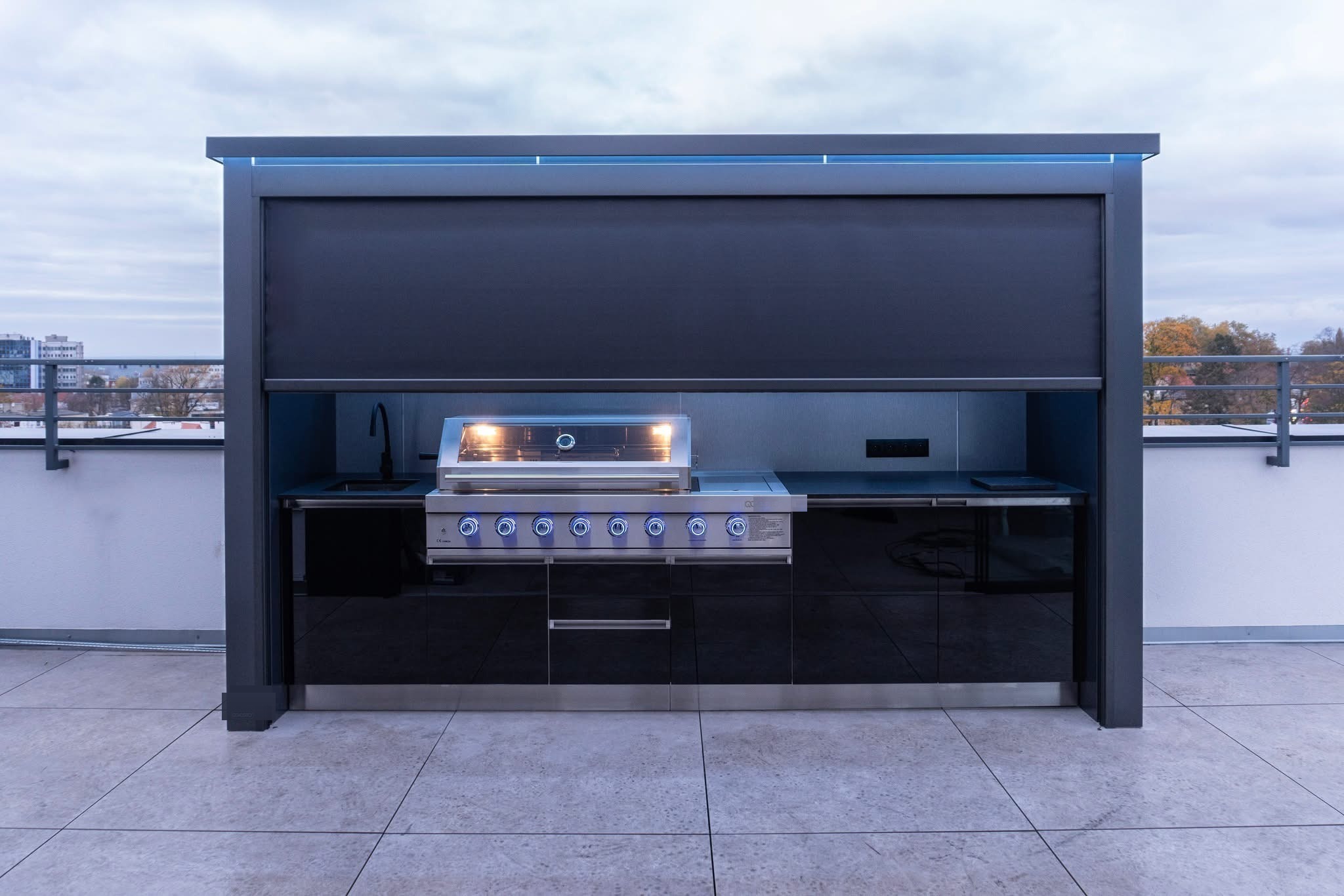Outdoor kitchen installed on a rooftop terrace