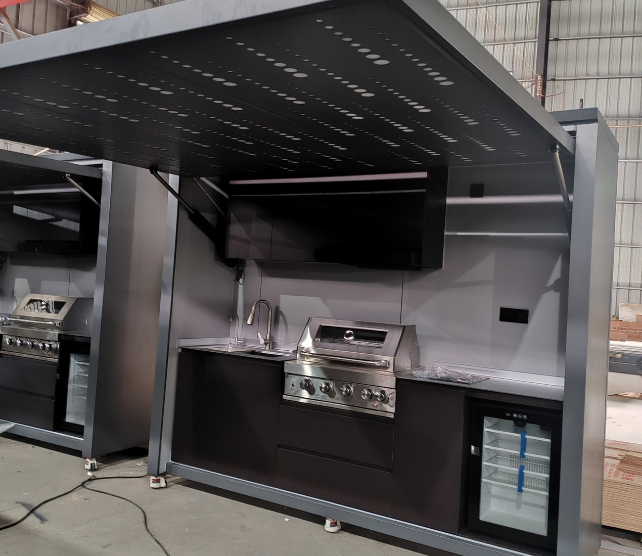 Star ceiling canopy detail with illuminated kitchen module